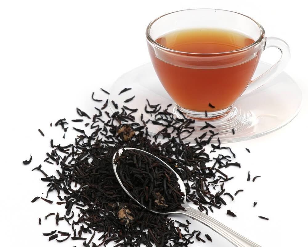 Amber tea liquor in crystal cup
